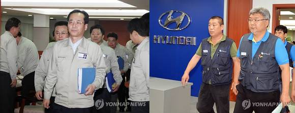 윤갑한 현대차 사장(왼쪽)과 이경훈 현대차 노조위원장(사진 오른쪽)이 합의를 마친 후 울산공장 내 교섭장에서 나오고 있다. (사진=연합뉴스)