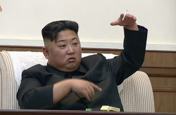 북한 조선중앙TV는 21일 김정은 국무위원장의 세 번째 방중 기록을 담은 영상을 공개했다. 영상에서는 주중 북한 대사관을 찾은 김정은 위원장이 간부들과 담소하면서 담배를 피우는 모습도 보였다.(사진=연합뉴스)